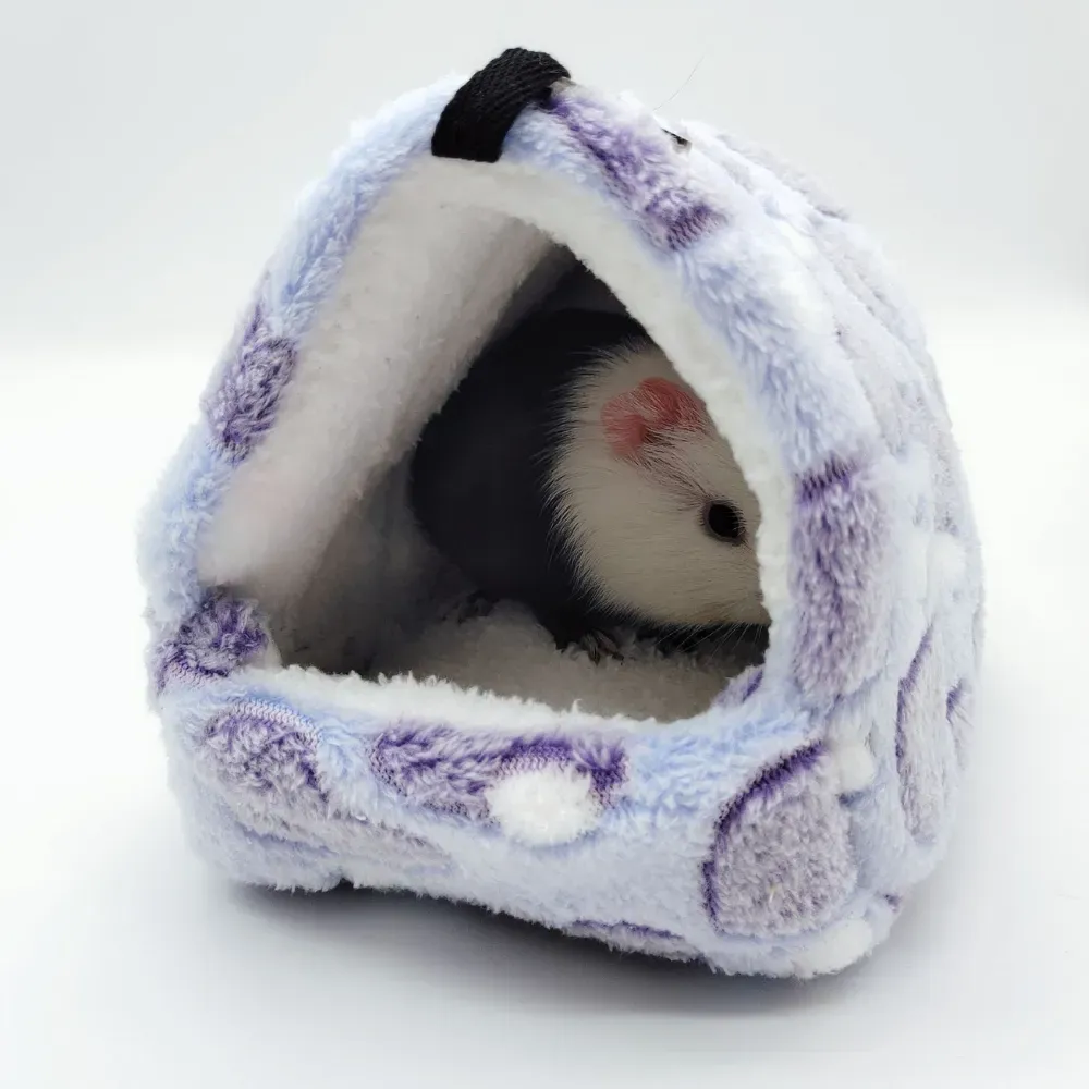 Made with ultra-soft fleece material and high-elastic sponge filling, this nest ensures pets stay warm and cozy. It is available in four sizes and is ideal for small and medium-sized pets like hamsters, rabbits, and sugar gliders.