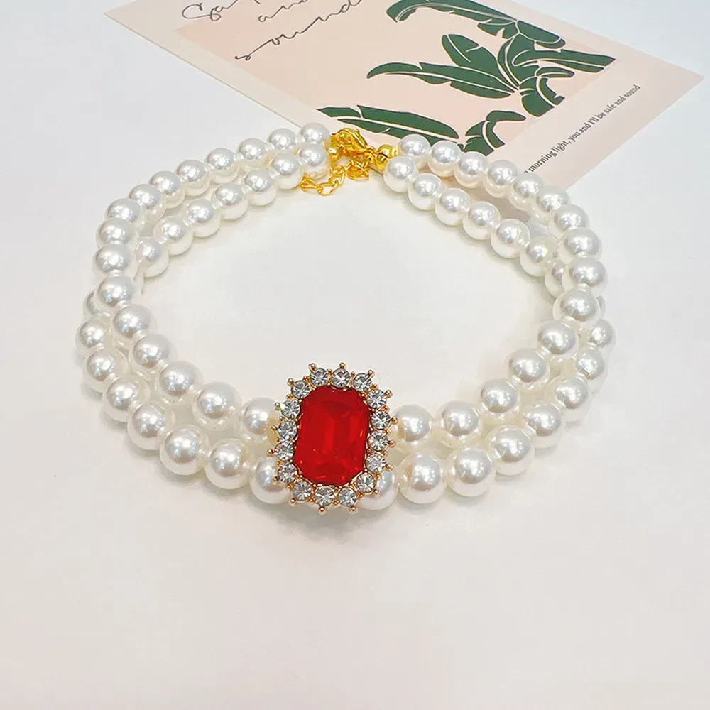 The collar features a secure, adjustable design and is adorned with sparkling rhinestones, perfect for retailers offering high-end pet products.