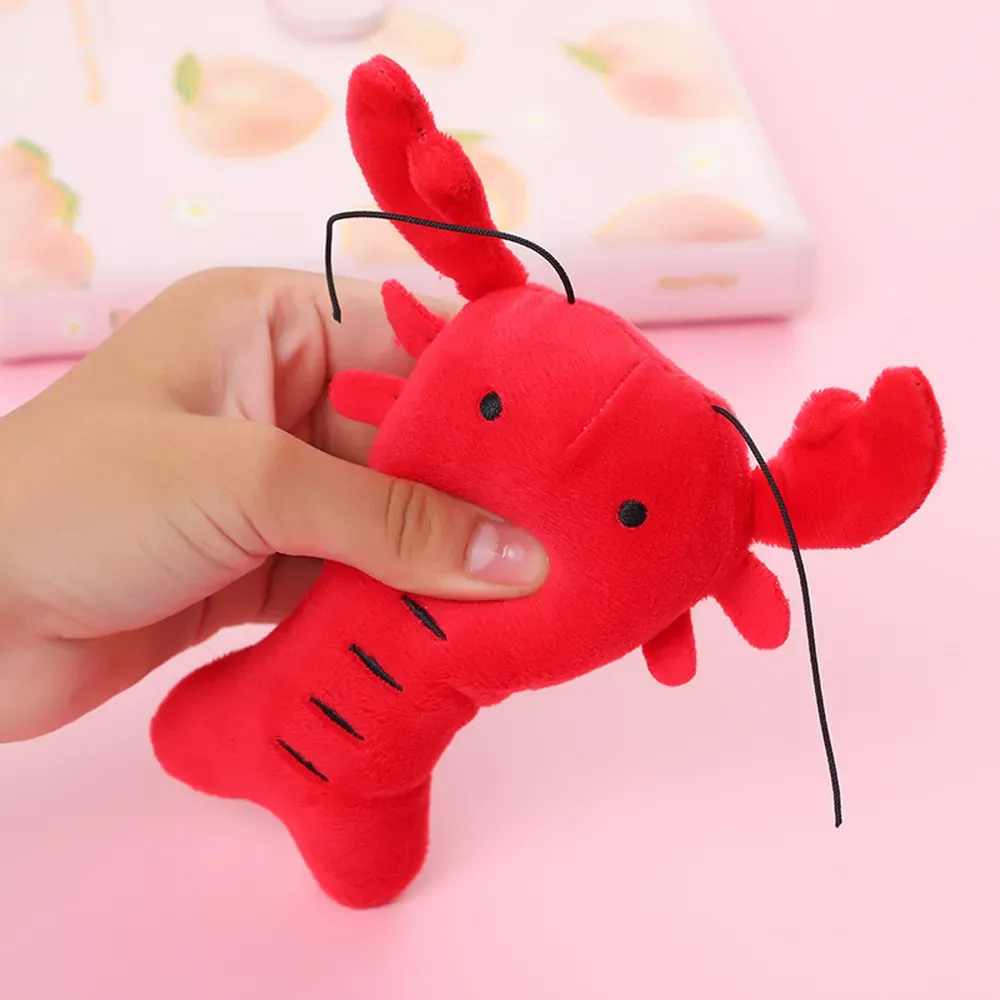 The soft, plush material of this interactive dog toy promotes healthy teeth and gums, providing a safe way for pets to clean their teeth while enjoying playtime. Perfect for pet stores offering oral care solutions for dogs.