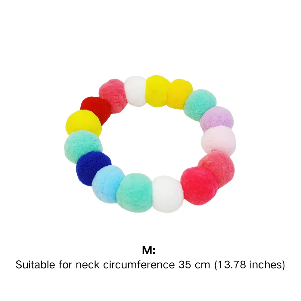 Cute, colorful pom-pom collar for cats and small dogs, adjustable, comfortable, and perfect for adding a touch of fun to pets' wardrobes.