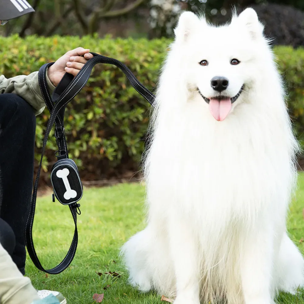 Hands-Free Dog Poop Bag Dispenser (14) Strong Velcro Straps for Easy Attachment: The dispenser is equipped with strong Velcro straps that make it easy to attach to leashes, belts, or bags.