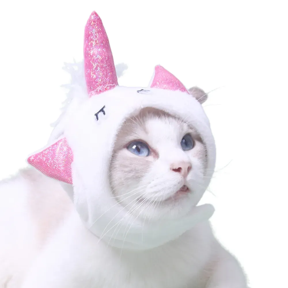 Unicorn hat for cats (2) This Halloween unicorn headpiece for pets features a colorful horn and playful design, perfect for dressing up cats and dogs for Halloween.