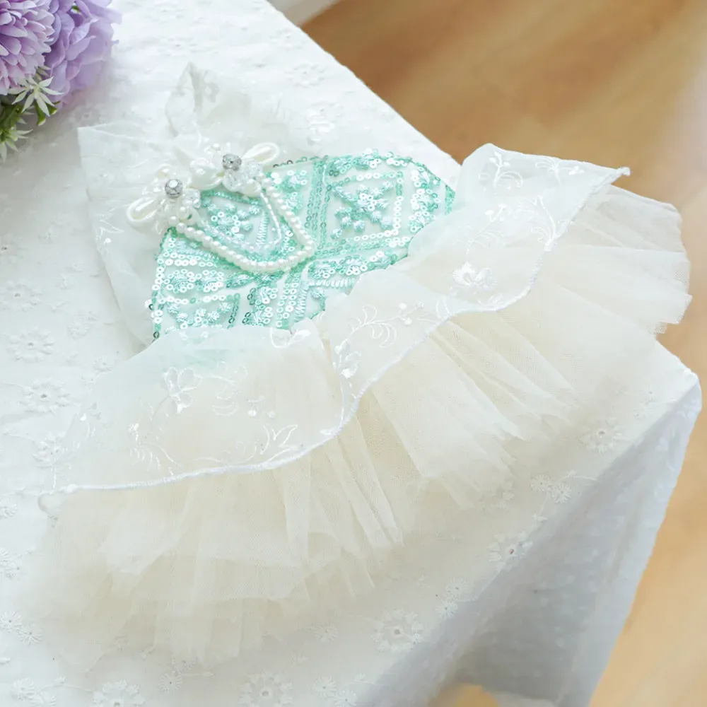 Designed with soft, lightweight tulle, this dress keeps pets comfortable while looking elegant, suitable for spring or summer occasions.