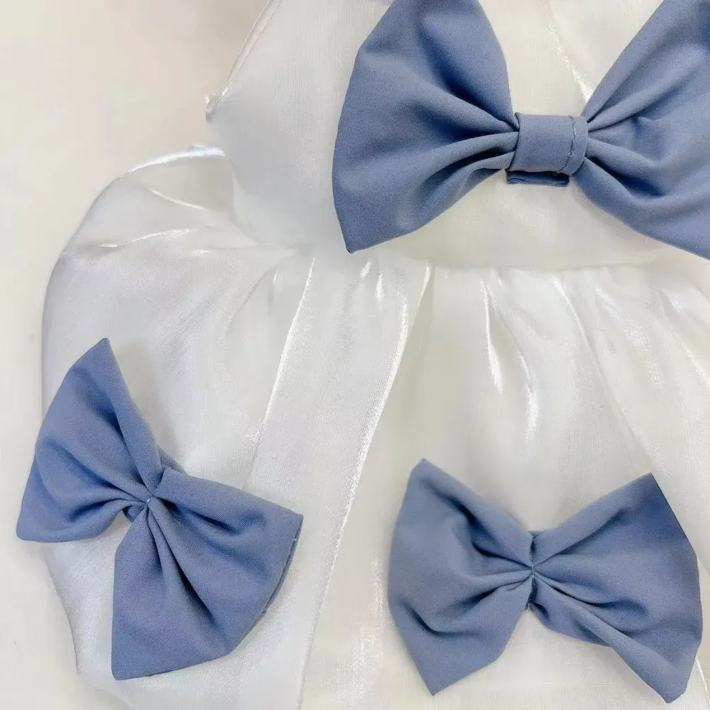 The dress is lightweight, breathable, and easy to wear, offering comfort without compromising on style—ideal for stores focusing on practicality and elegance for pets.