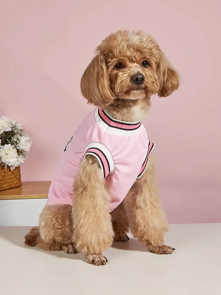 Basketball-style pet jersey with sporty design for fun and fashion.