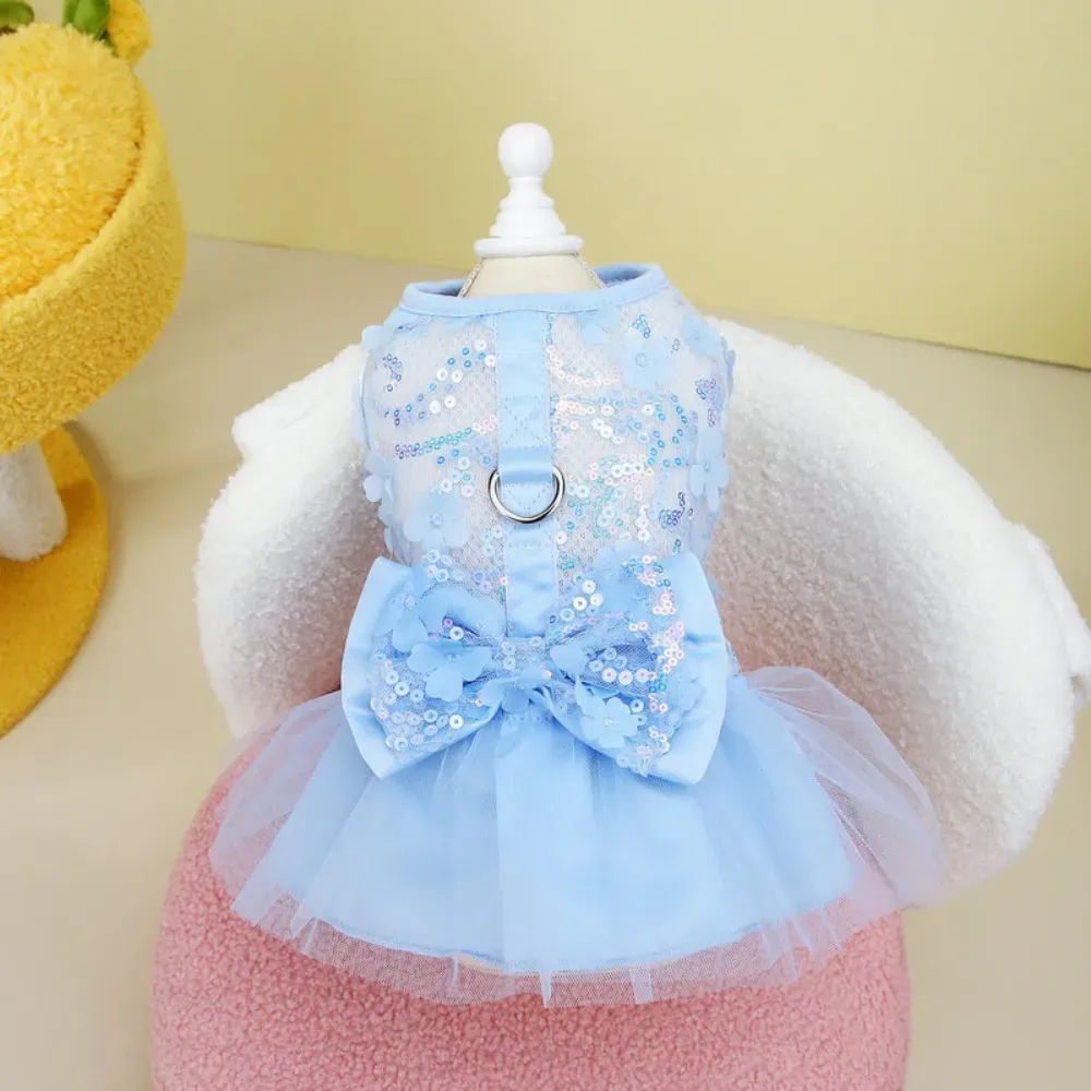Designed with a convenient D-Ring, this dress allows for easy leash attachment, combining fashion with functionality. Ideal for small to medium-sized dogs, it provides a secure and stylish walking experience.