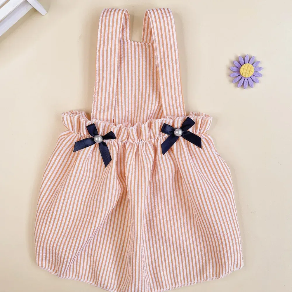 A beautifully placed bow decor enhances the overall look, creating a sophisticated and cute appearance. This stylish addition makes the dress ideal for celebrations, photoshoots, and daily wear.