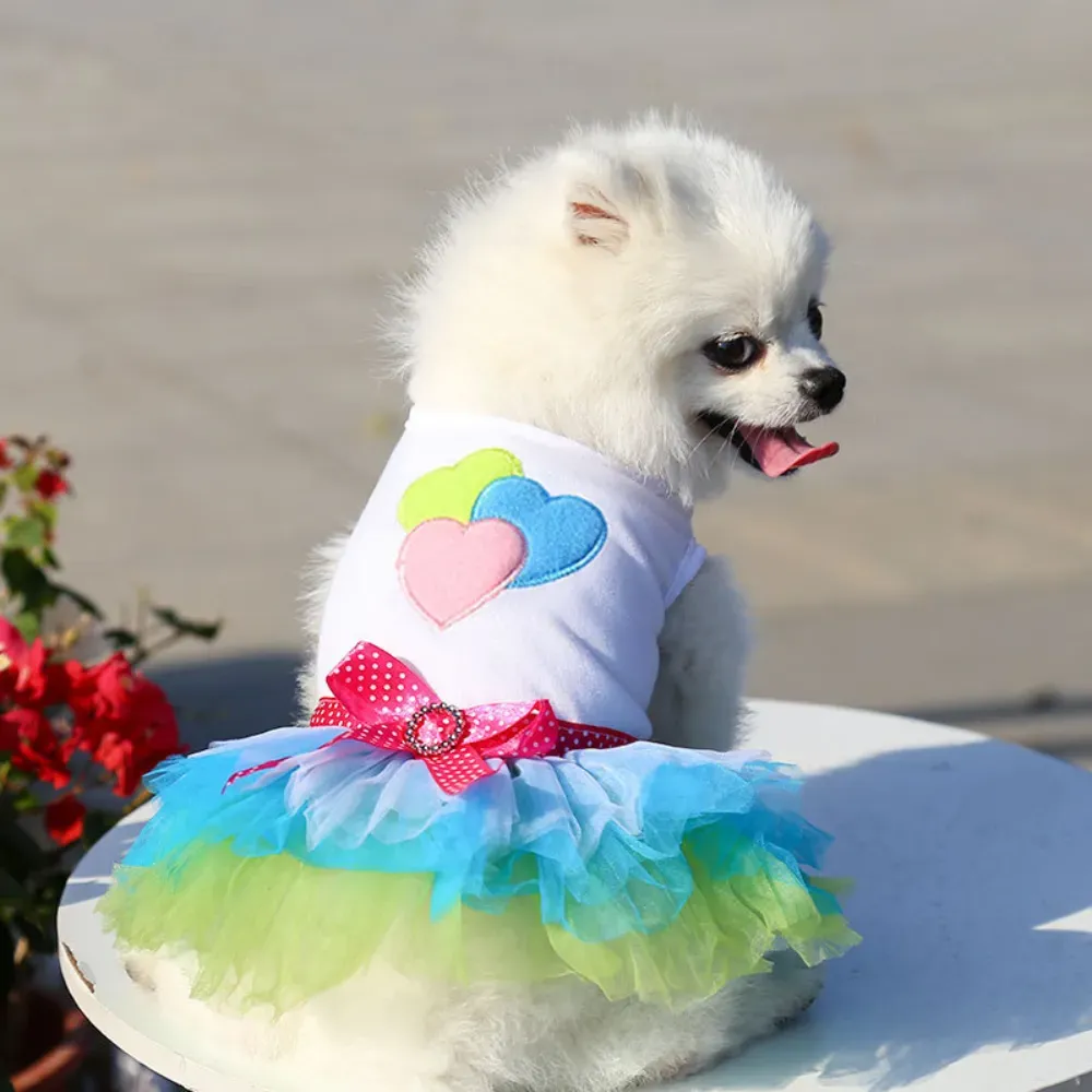 Designed with a layered tulle skirt, this dress gives pets a graceful and charming appearance, perfect for stylish outings.