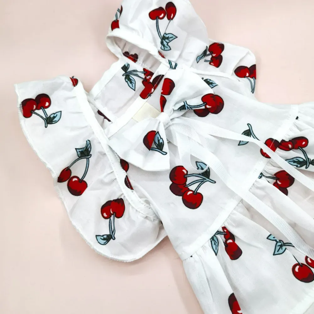 "Stylish coordinated pet outfit combining seasonal patterns with soft materials."