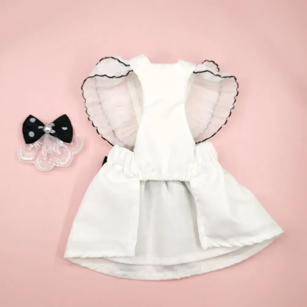 "Elegant pet dress with bow accent, matching necklace and hair clip, perfect for special occasions or everyday wear."