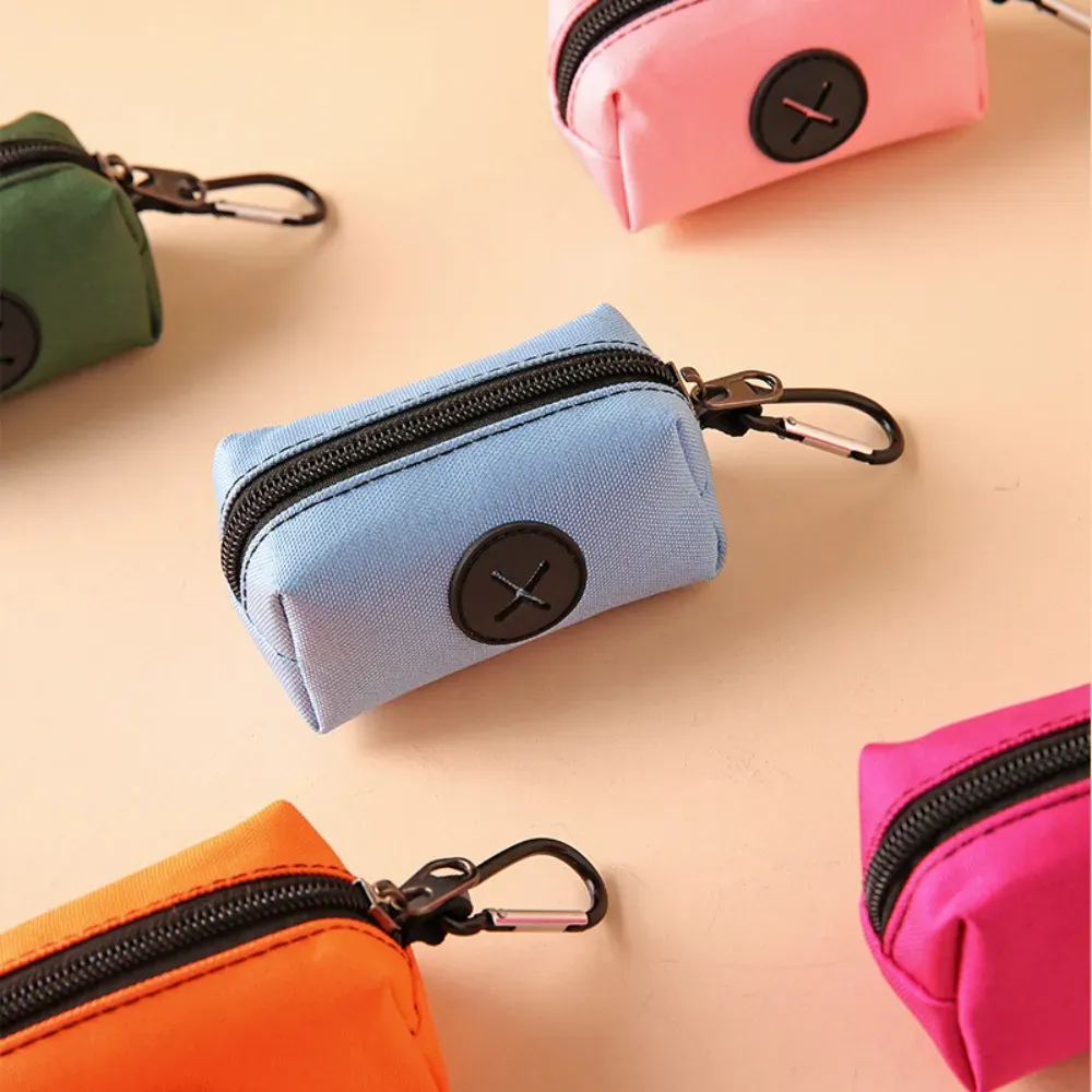 "Universal fit waste bag dispenser compatible with standard rolls and built for easy daily use."