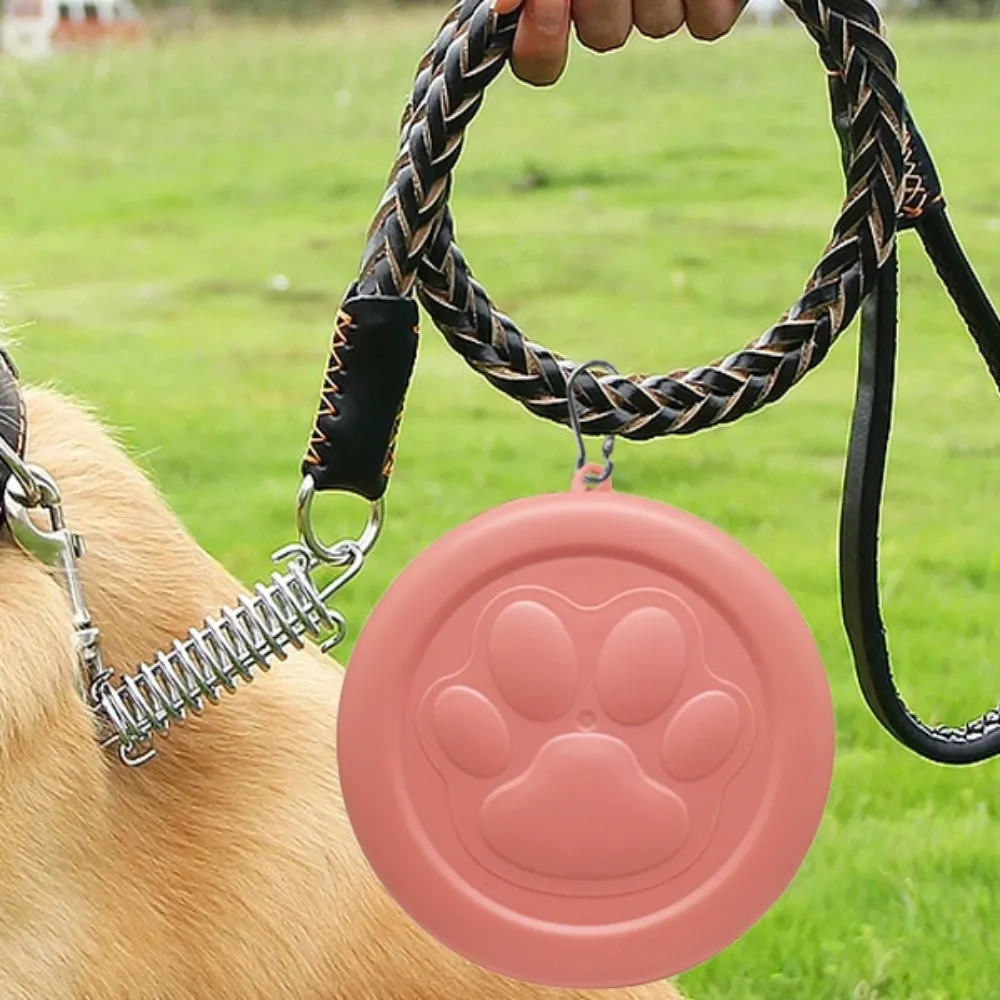 portable collapsible dog bowl with clip attached to dog leash for outdoor travel