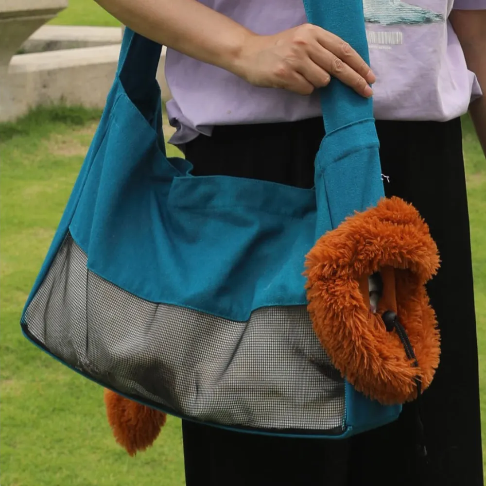 portable cat carrier tote bag used outdoors lightweight breathable mesh design comfortable pet travel bag