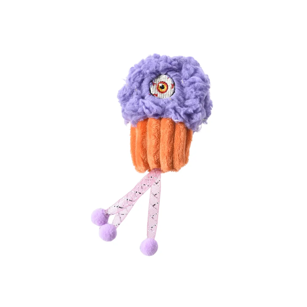 Halloween Monster Eyeball Cupcake Cat Toy A purple plush cupcake cat toy featuring a creepy eyeball design, orange base, and dangling pink ribbons with pom-poms.