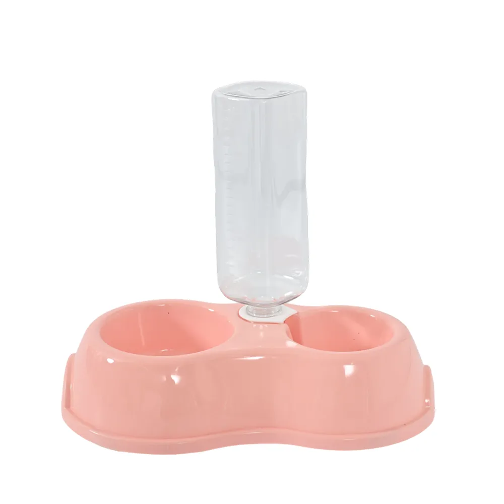 Studio shot of the pink double cat bowl with a clear vertical water bottle on a white background.
