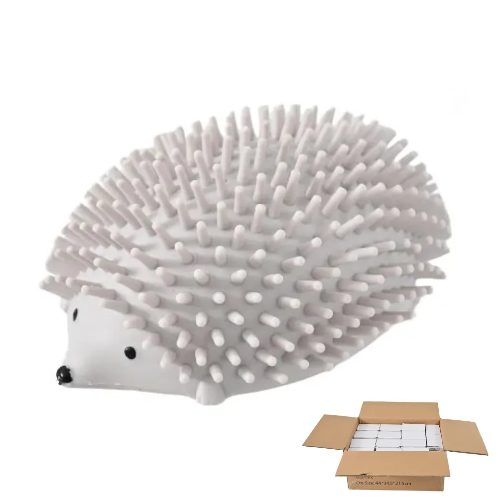 Grey hedgehog pet massage and dental toy alongside its packaging box.