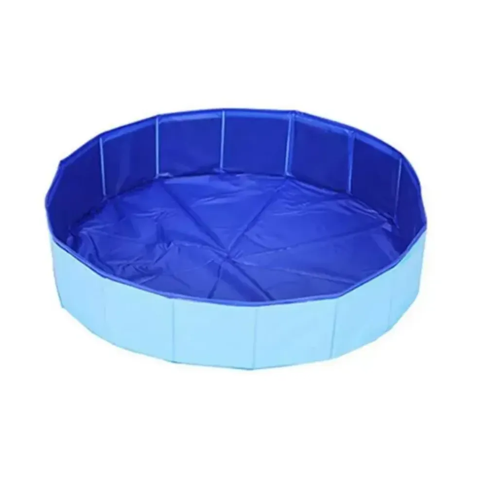 A studio shot of the blue foldable pet pool in its open position, showing the ribbed side panels for stability.