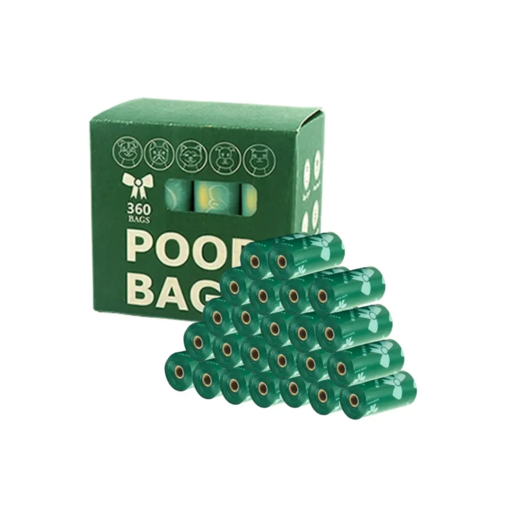 Stacked rolls of green eco-friendly dog poop bags with a light green bowknot print.