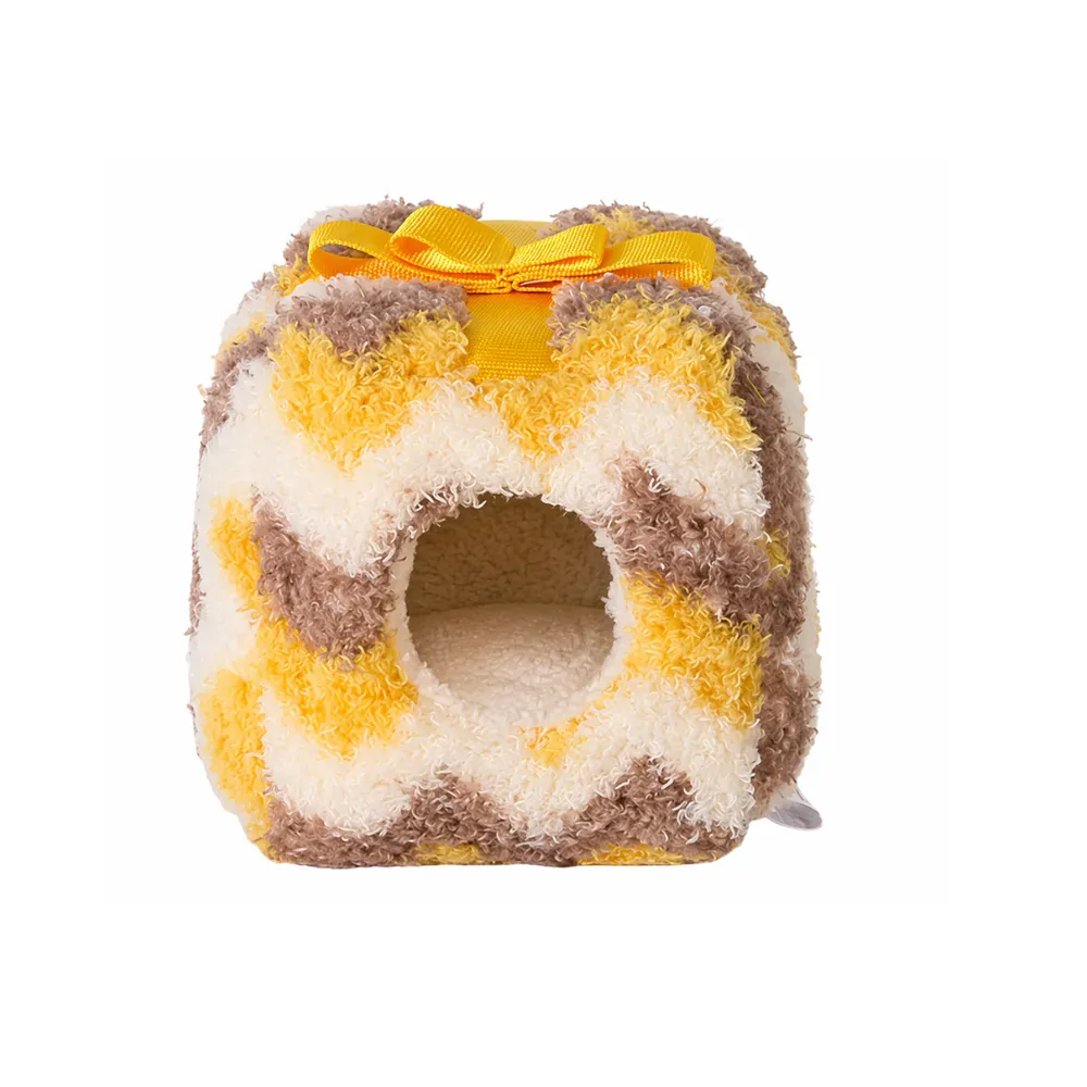 Front view of a yellow and brown chevron pattern plush hamster house with a yellow ribbon.