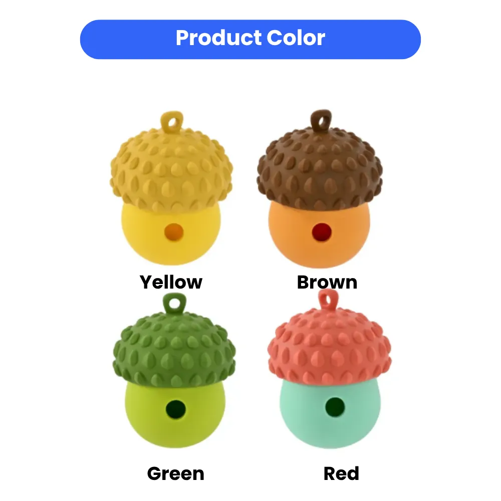 Four different colors of acorn pet treat dispensers including yellow, brown, green, and red-teal combinations.
