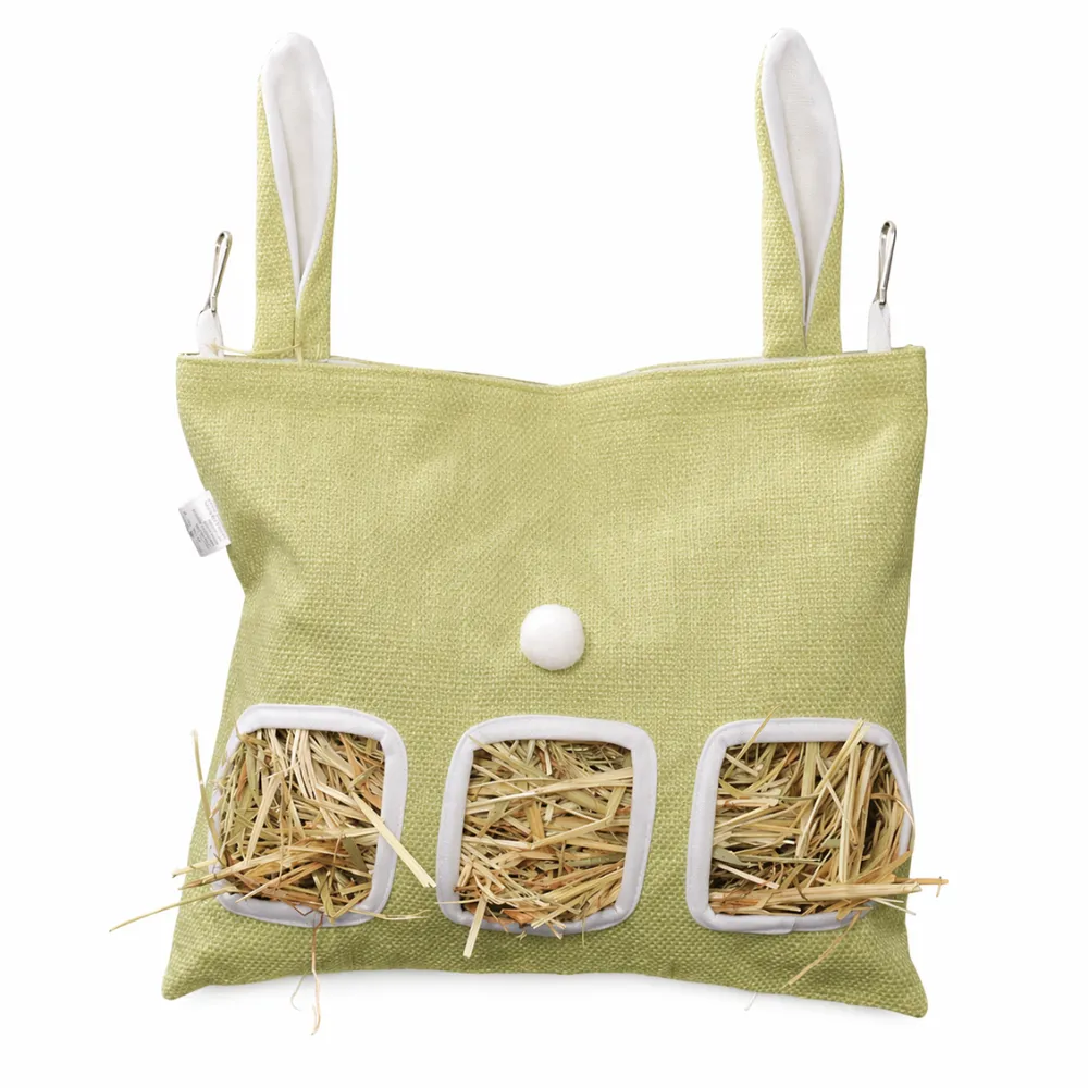 Front view of a sage green fabric hay feeder bag with white trim and three feeding holes.