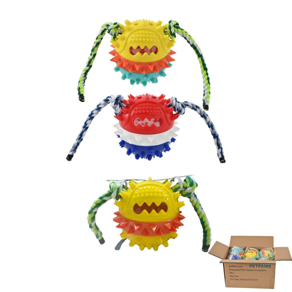 multi-color-interactive-spiky-dog-chew-toys-wholesale A group of three spiky interactive dog toys in red, yellow, and blue colors with cotton ropes, including a bulk shipping carton.