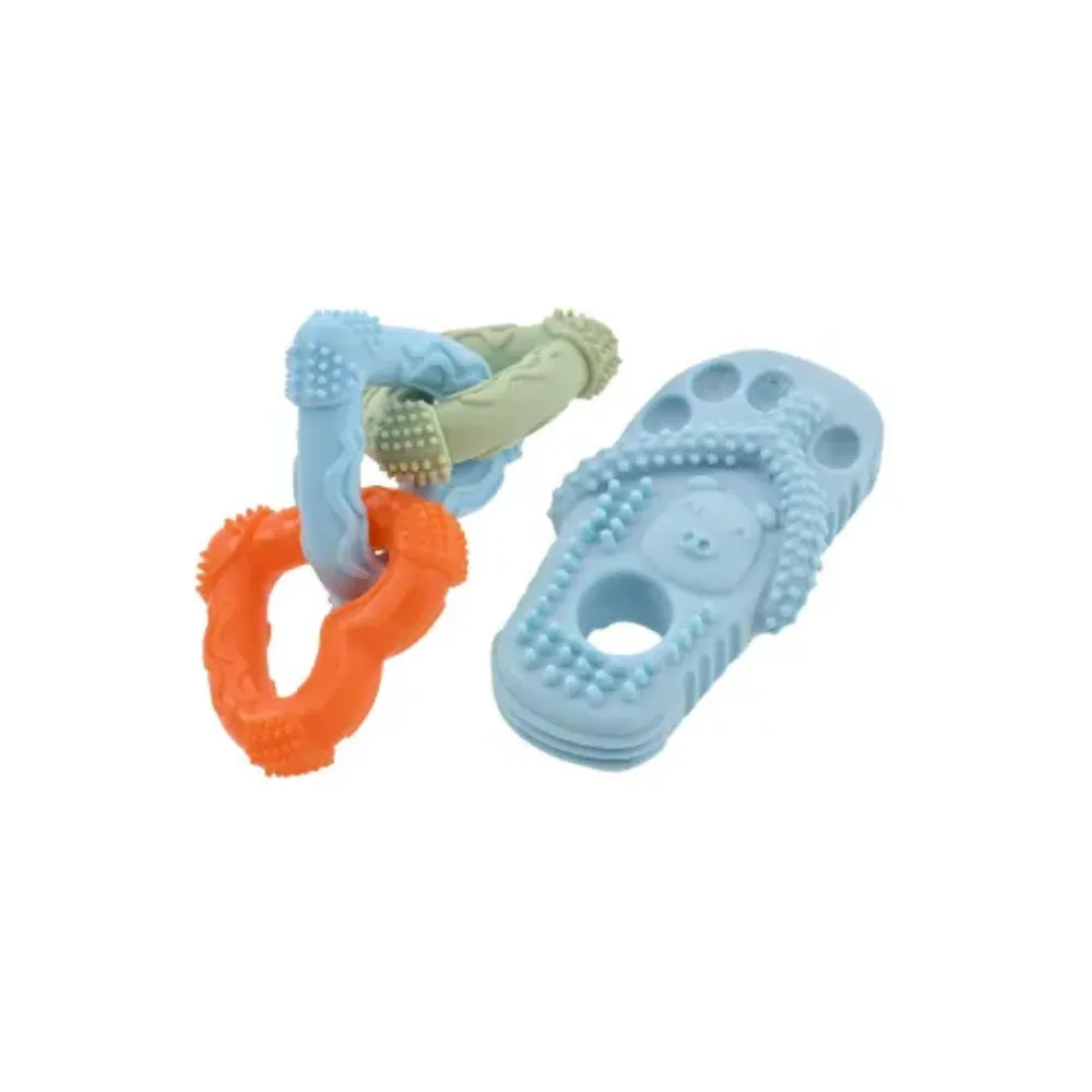 Blue slipper-shaped dog toy with textured bumps paired with interlocking orange, blue, and green rings.