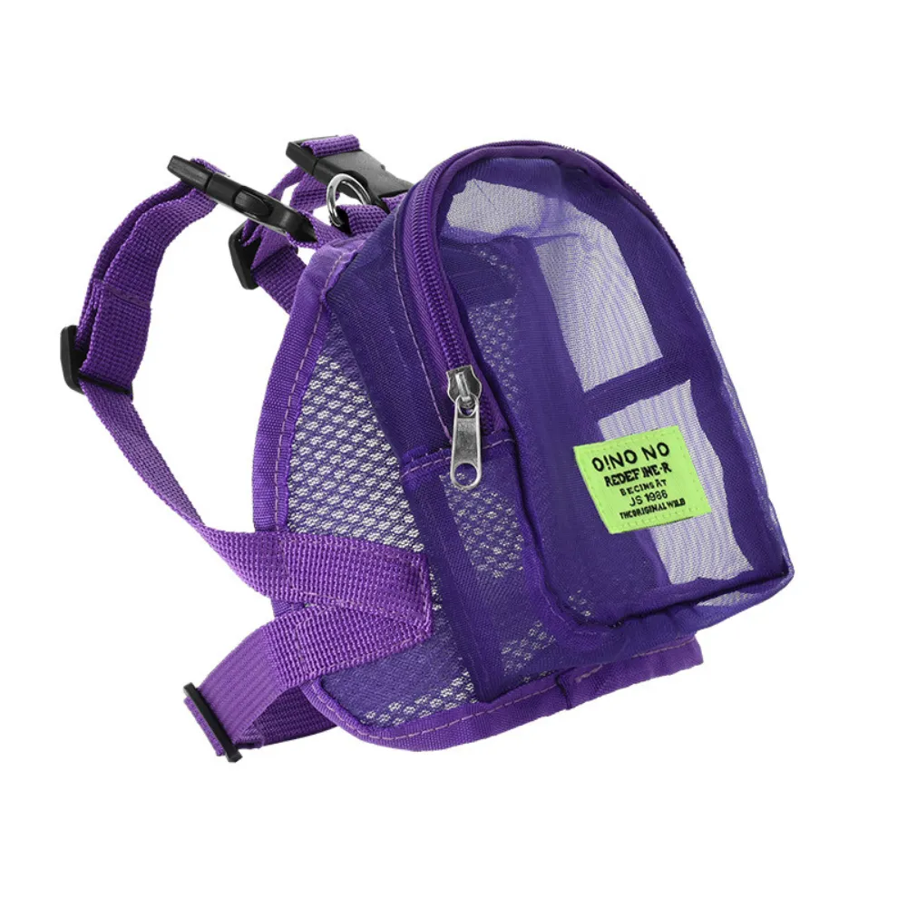 Purple-Small-Dog-Backpack-Harness-Petfairs A purple adjustable mesh puppy backpack with zippered storage compartment and a bright green label.