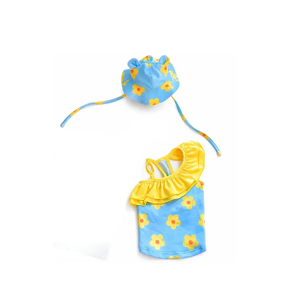 Blue floral one shoulder dog swimsuit with yellow ruffle and matching pet sun hat
