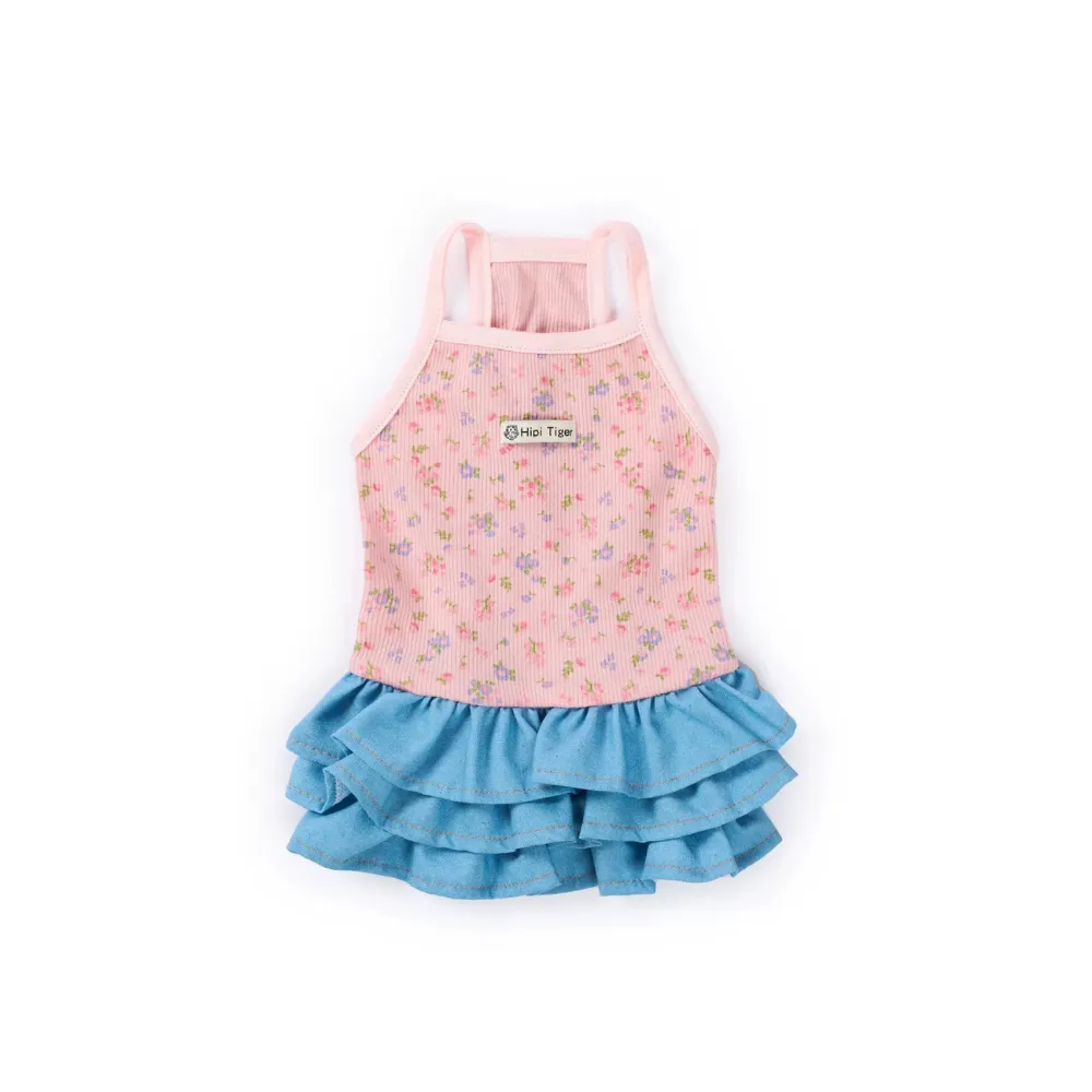 Pink floral pet dress with layered denim skirt for cats and small dogs isolated on white background