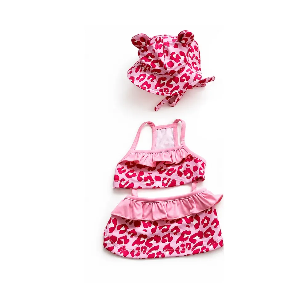 Pink leopard print dog bikini swimsuit set with ruffle skirt and matching pet bucket hat