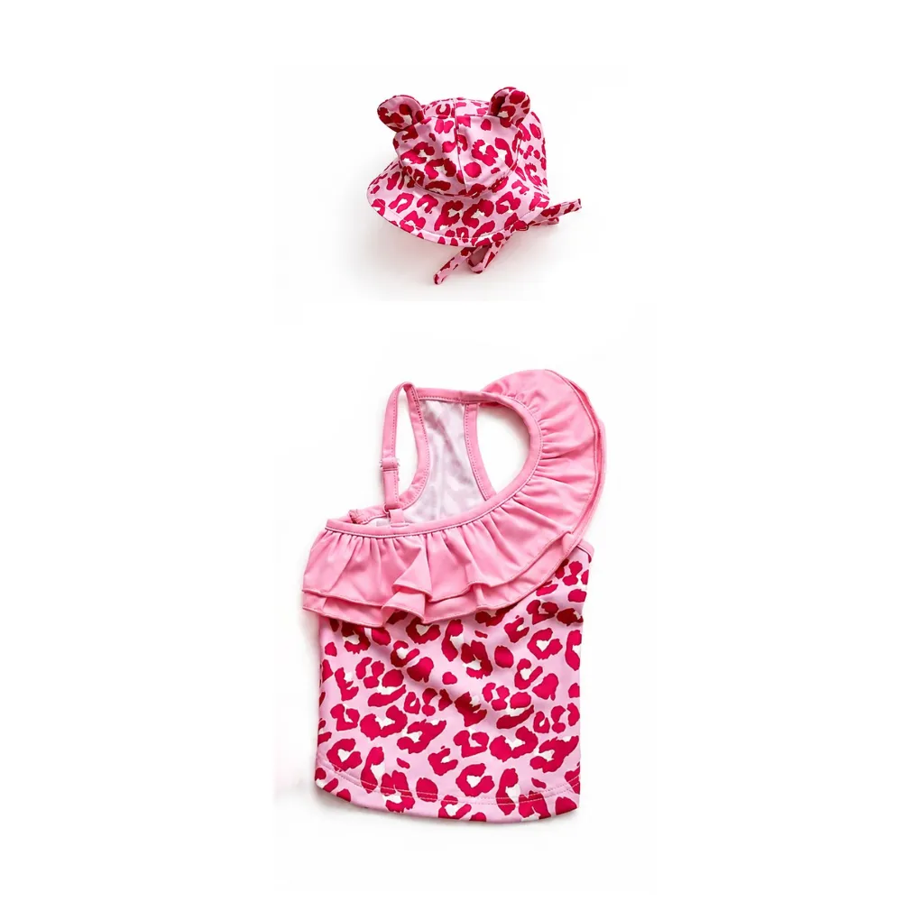 Pink leopard print one shoulder dog swimsuit with large ruffle collar and matching pet hat