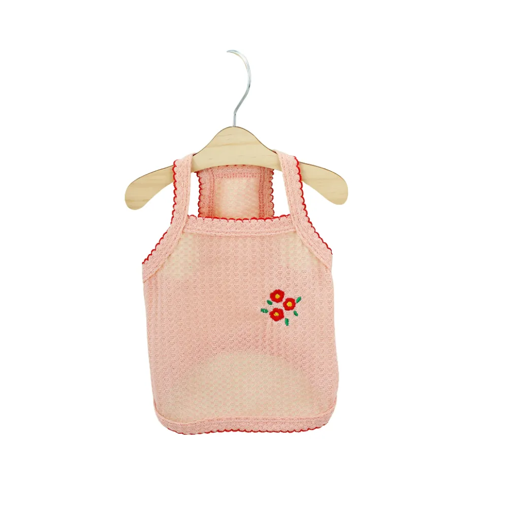 Pink sleeveless mesh dog shirt featuring a red flower embroidery and delicate scalloped red trim.