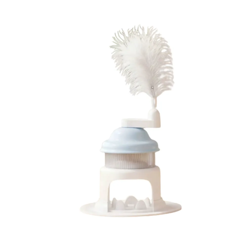 Blue rotating cat treat dispenser toy with feather teaser isolated on white background