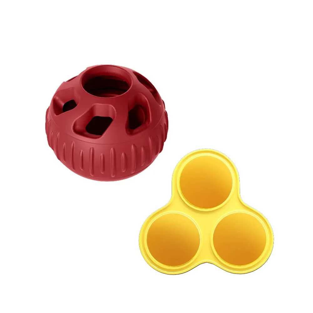 Red silicone dog treat ball with reusable frozen snack mold for interactive pet feeding