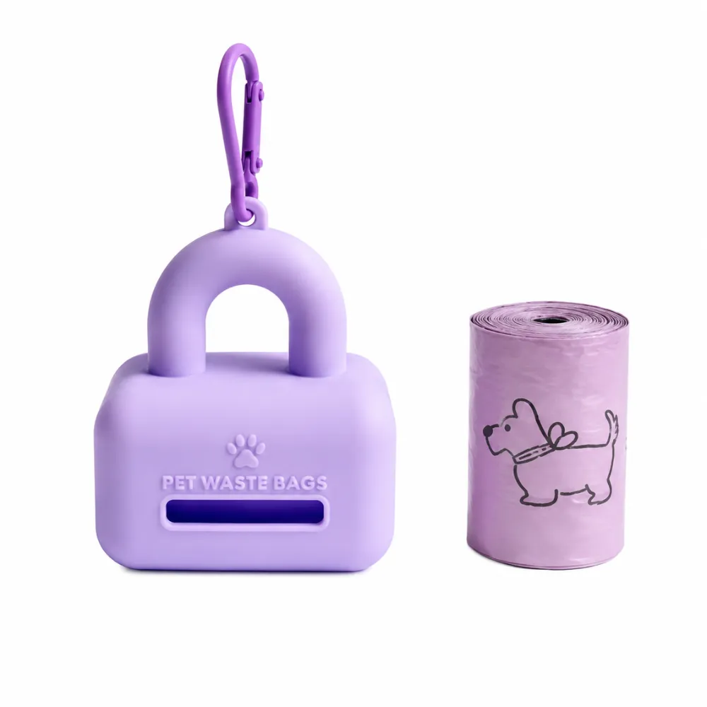 Purple silicone dog poop bag dispenser with matching waste bag roll and hanging clip