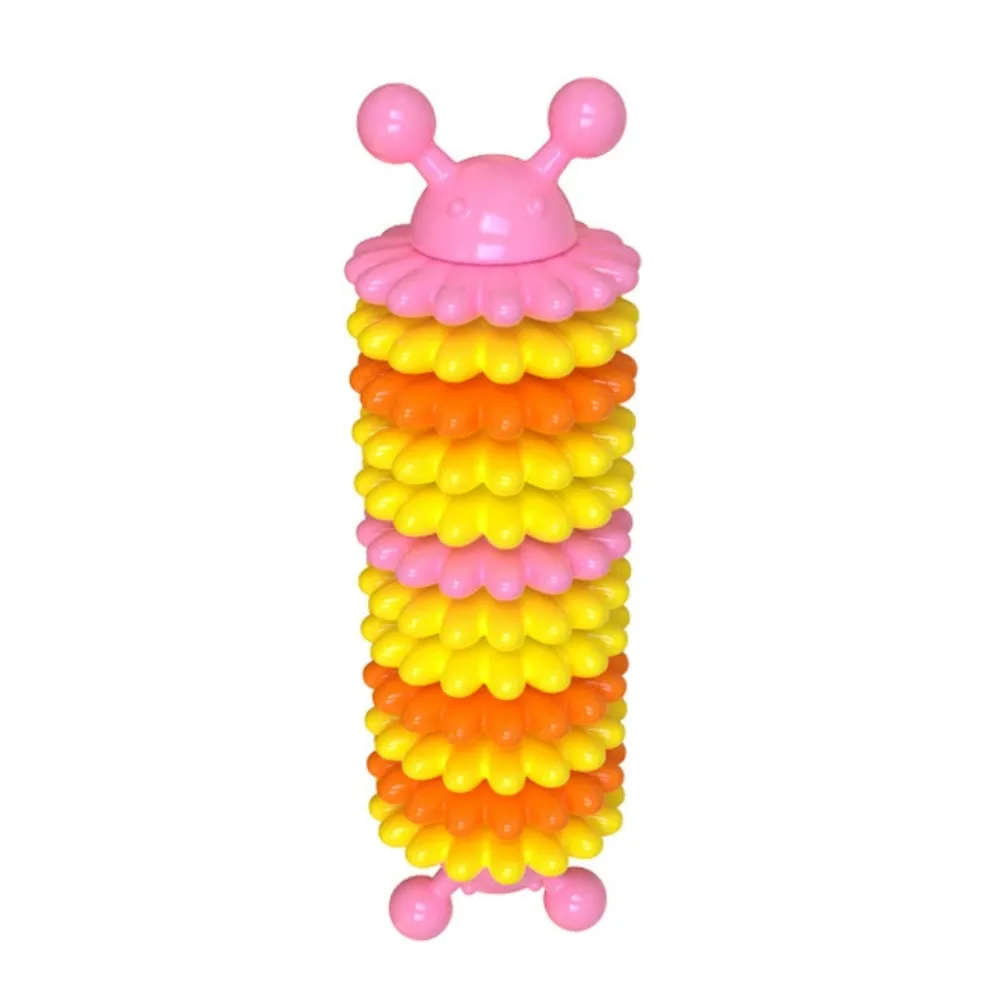 Pink caterpillar shaped TPR dog chew toy with textured surface for chewing and oral care