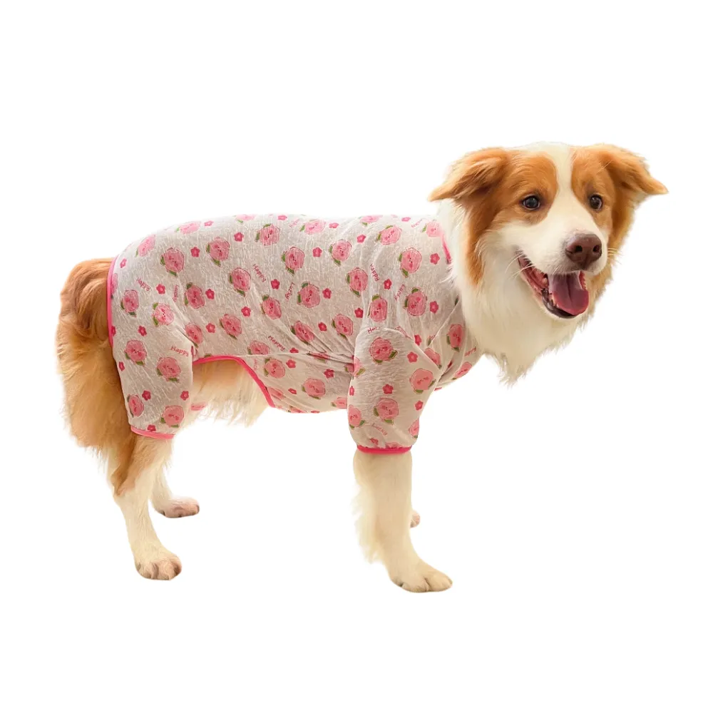 Large dog wearing pink floral breathable dog pajamas with lightweight mesh material