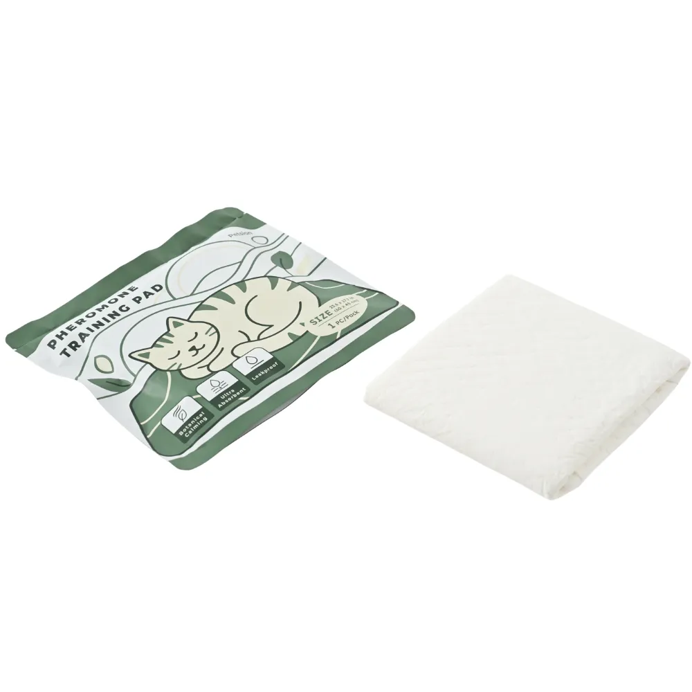 White cat pheromone training pad with plant extract calming formula packaging and absorbent training pad on white background