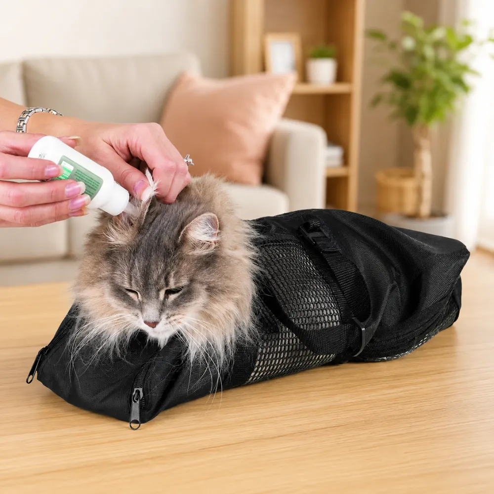 Cat restraint grooming bag used for ear cleaning, medication application, and veterinary care