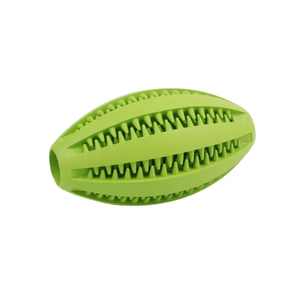 Green rugby-shaped dog dental toy with textured grooves for cleaning teeth