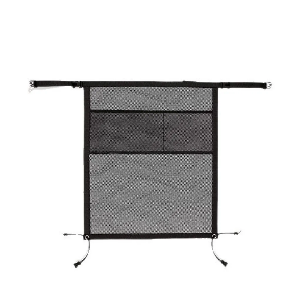 Black car dog barrier net with storage pockets for vehicle pet safety and travel