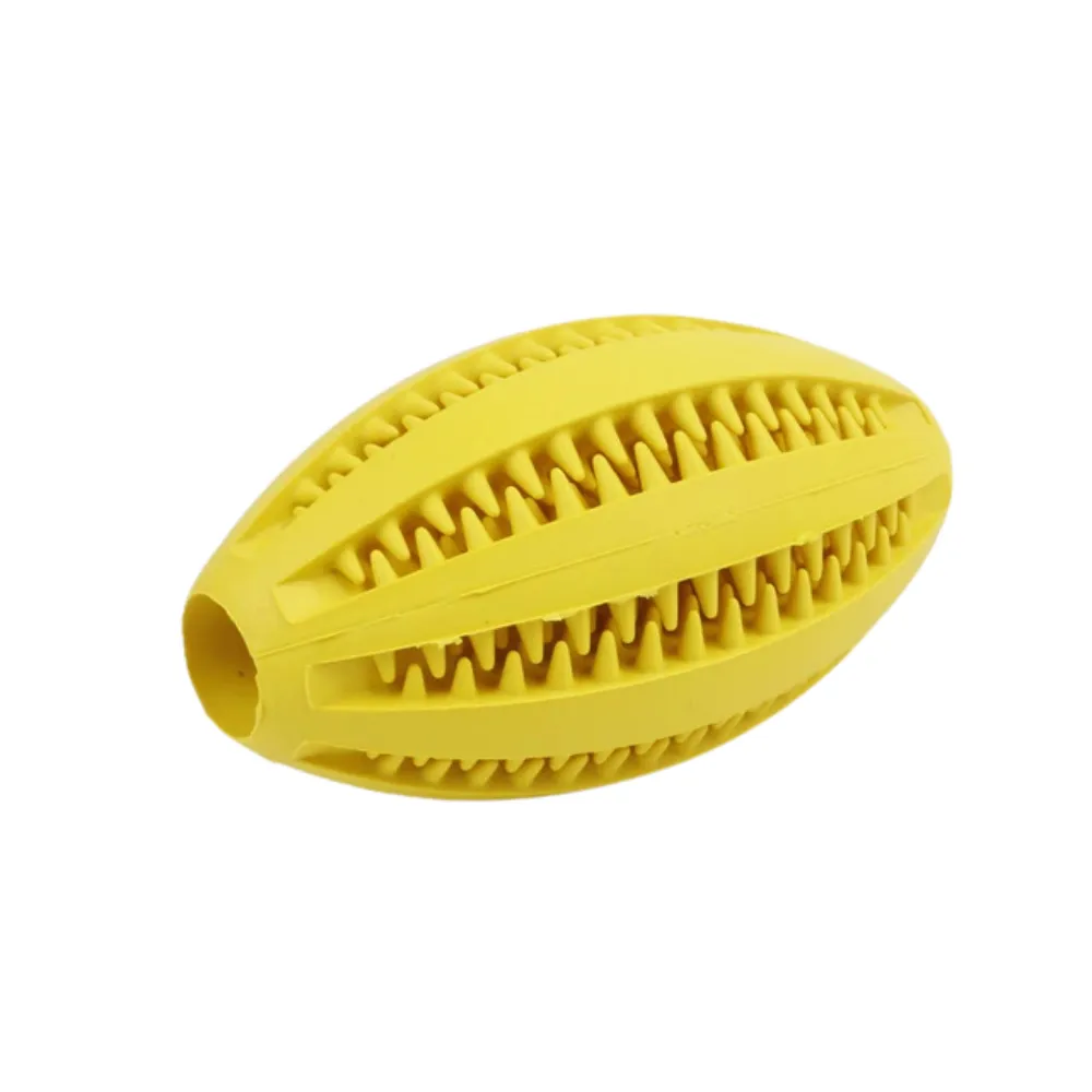 Yellow rugby dog toy designed for treat dispensing and dental cleaning