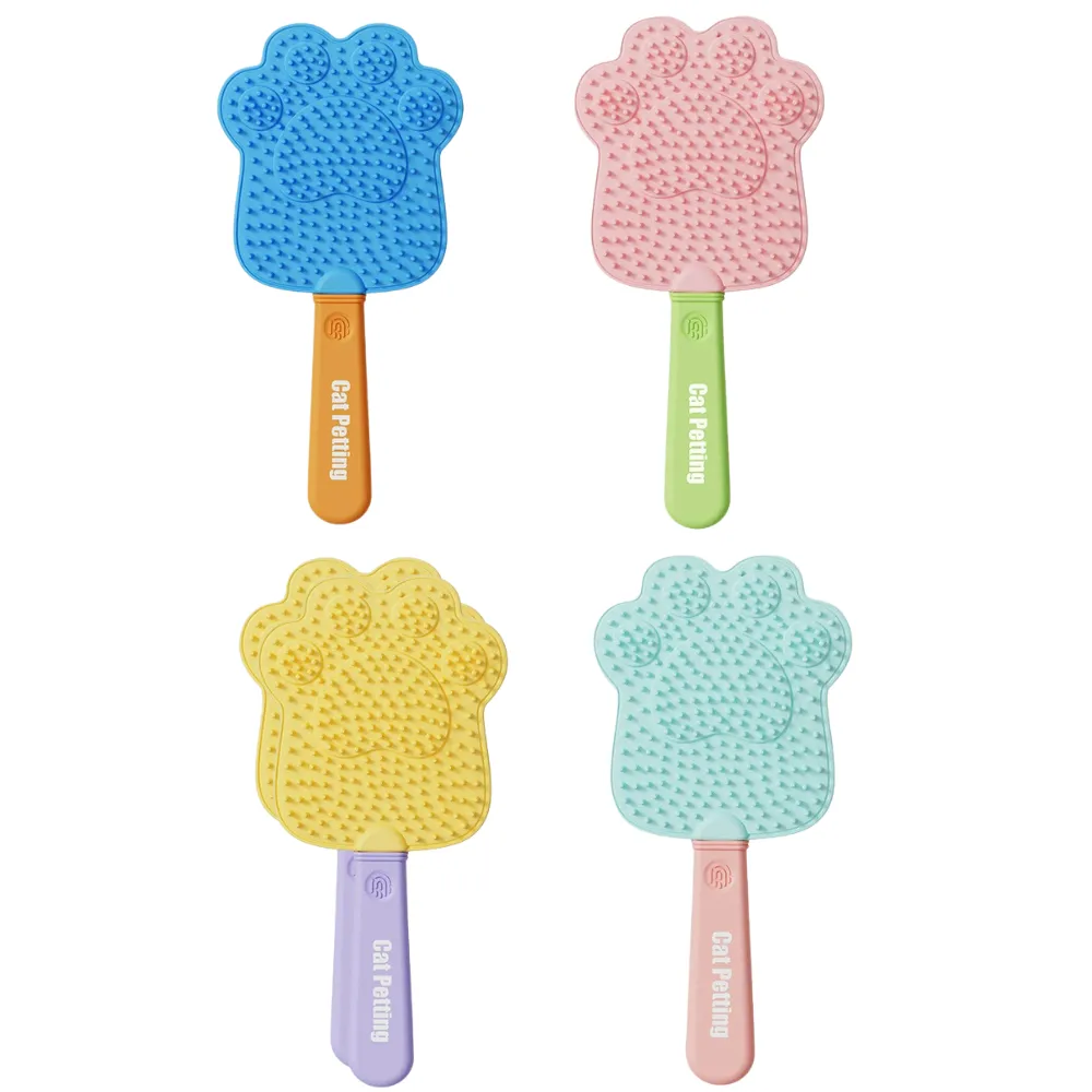Cat Grooming Brush Available in Four Color Options Silicone pet grooming brushes in blue, pink, yellow and mint green color options