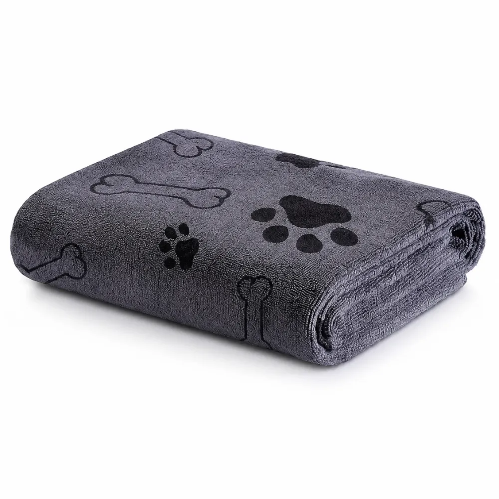 Gray Quick Dry Pet Bath Towel for Dogs and Cats Folded gray quick dry pet bath towel with paw print and bone pattern for dogs and cats