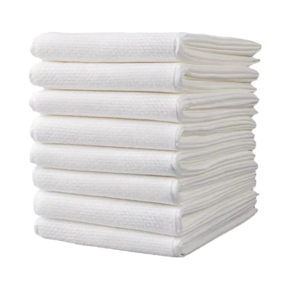 Wholesale Disposable Dog Bath Towels for Pet Stores Folded white disposable dog bath towel with soft textured surface
