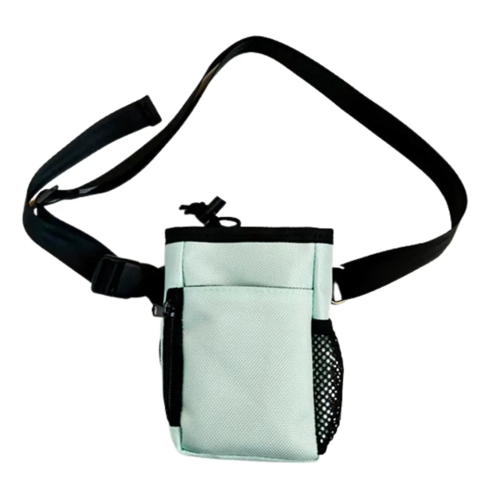 Blue dog training treat bag with adjustable shoulder strap and storage pockets