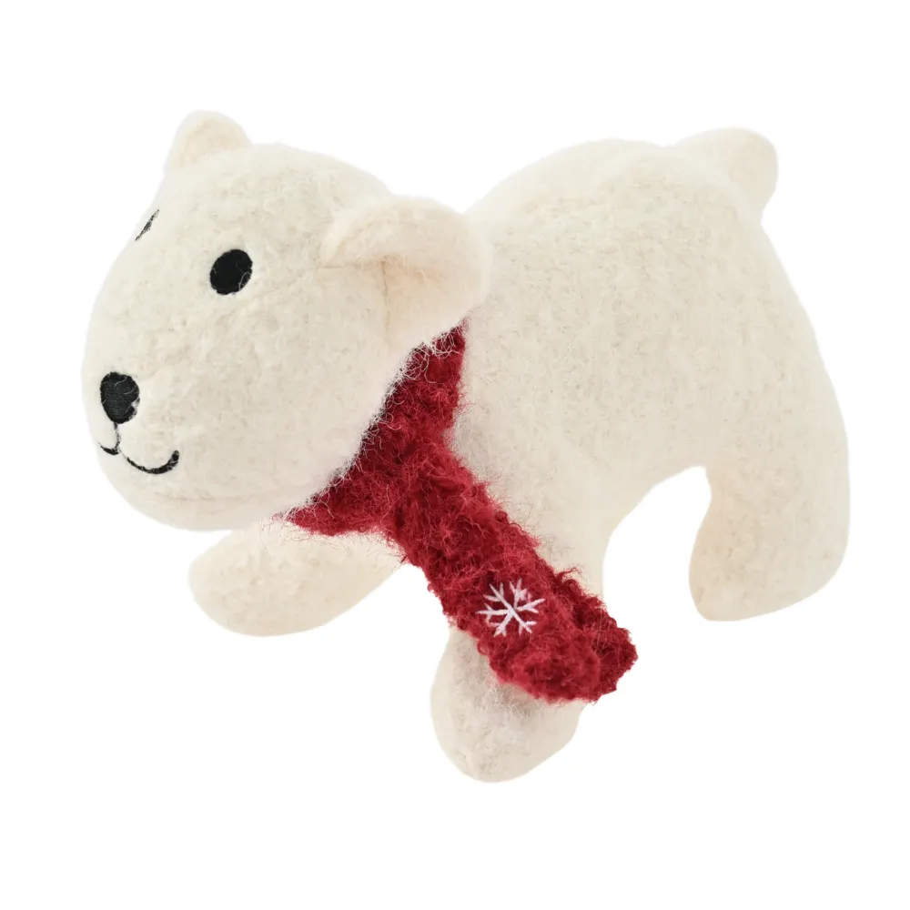 White Christmas felt polar bear plush dog toy with red scarf on a clean background