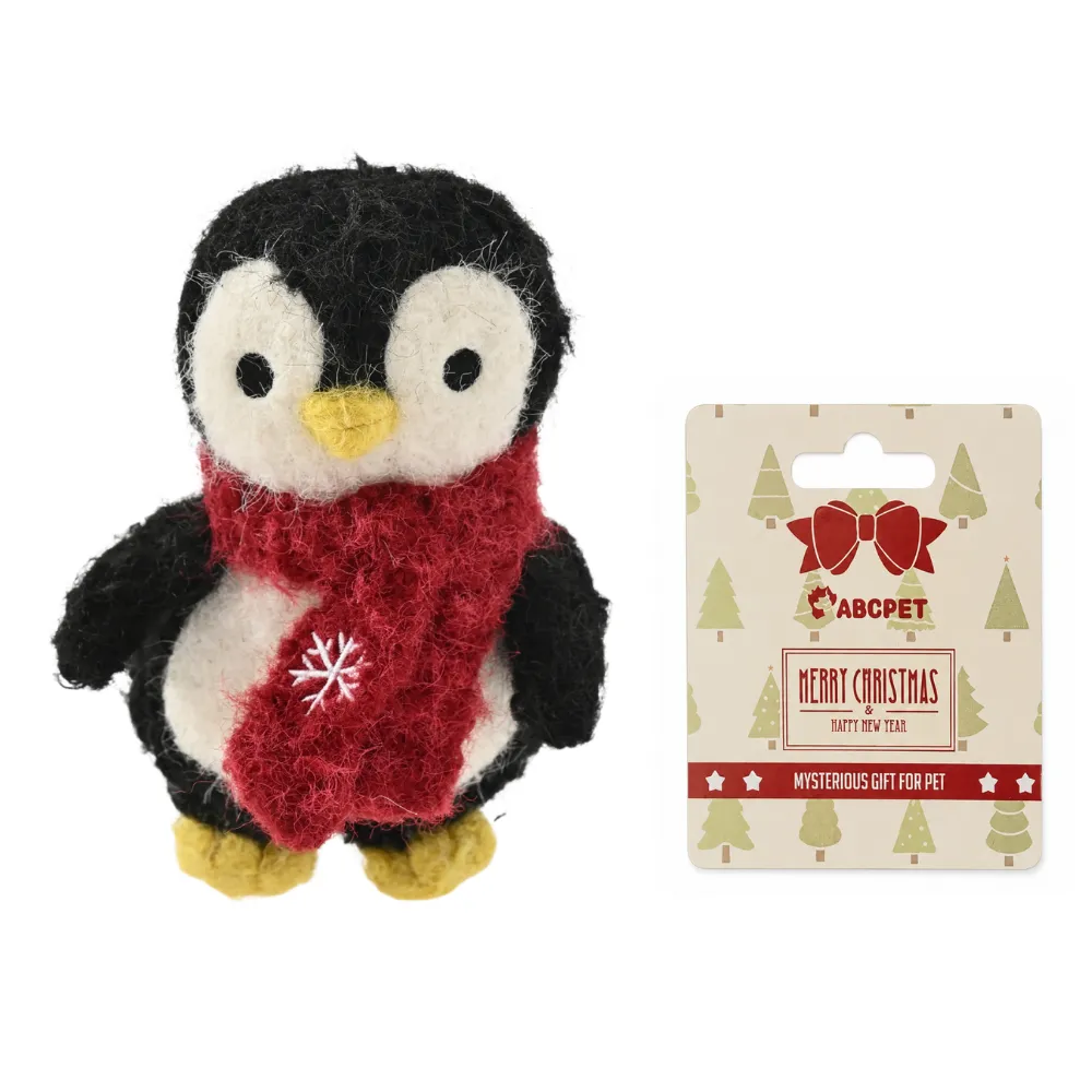 Christmas Penguin Dog Plush Toy with Packaging Christmas penguin felt dog plush toy displayed with custom holiday hang tag packaging