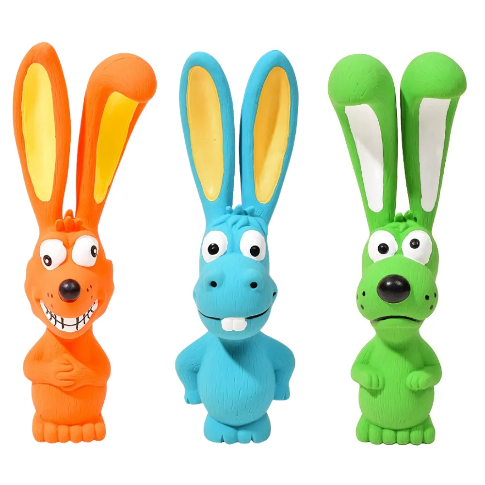 Orange, blue and green long-ear latex squeaky dog toys on white background
